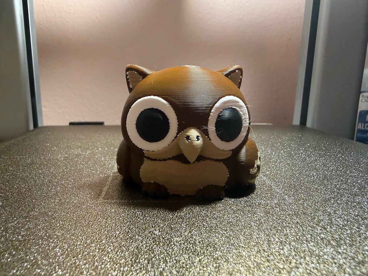 A four-colour printed owl